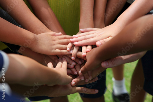 group of young people's hands