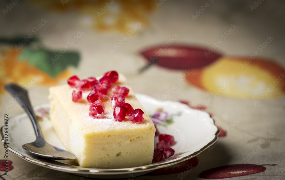 Cake with pomegranate seeds