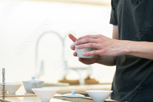 Tea pouring into glass  