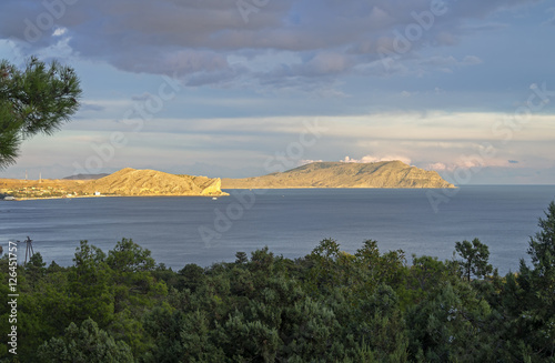 Coastal mountains in the sunset. Crimea, September. photo