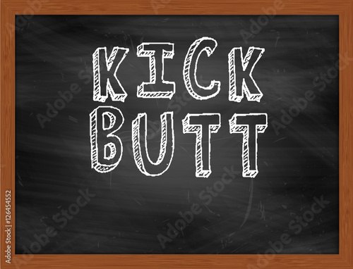KICK BUTT handwritten text on black chalkboard