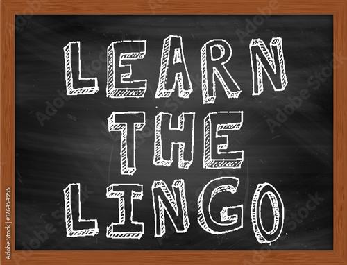 Foto LEARN THE LINGO handwritten text on black chalkboard