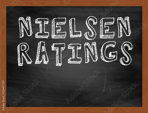 NIELSEN RATINGS handwritten text on black chalkboard photo