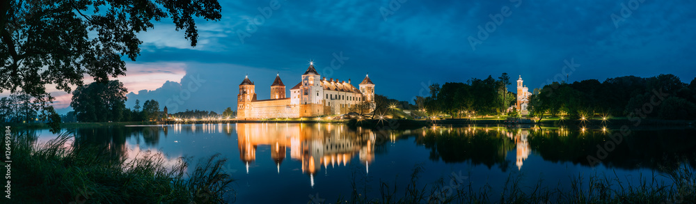 Belarus. Panoramic View Of Mir Castle Complex In Evening Illumin