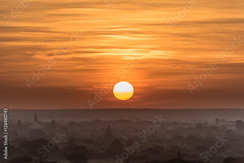 Sunrise with the view of Bagan plains and its pagodas in silhouette, Myanmar