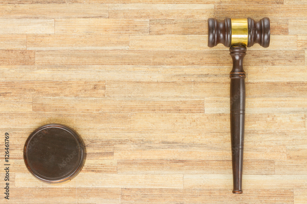 Wooden Law Gavel, copy space on wooden table desktop Wooden Law Gavel, copy space on wooden table desktop