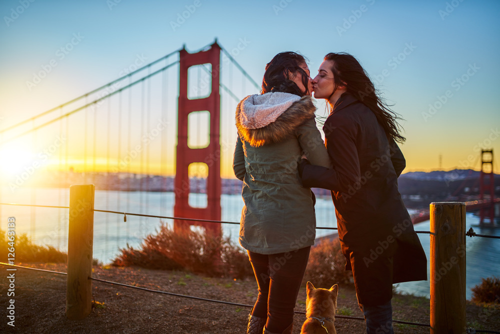 Picture Idea: Romantic Lesbian Couple Kissing At Golden Gate Bridge With Pet