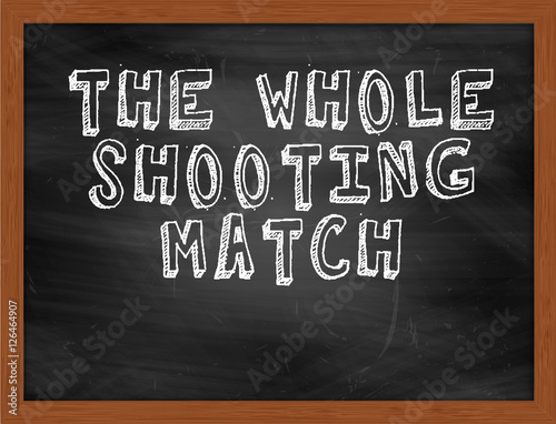 THE WHOLE SHOOTING MATCH handwritten text on black chalkboard