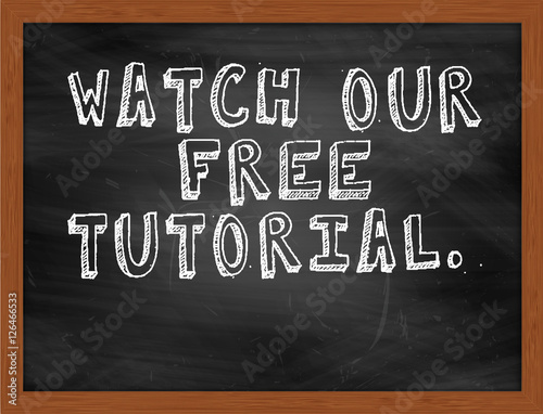 WATCH OUR FREE TUTORIAL handwritten text on black chalkboard