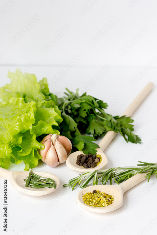 fresh salad with garlic and spices on white background fresh salad with garlic and spices on white background