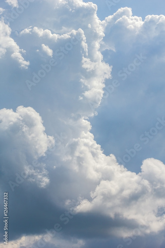 Cumulonimbus clouds in the blue sky, close-up