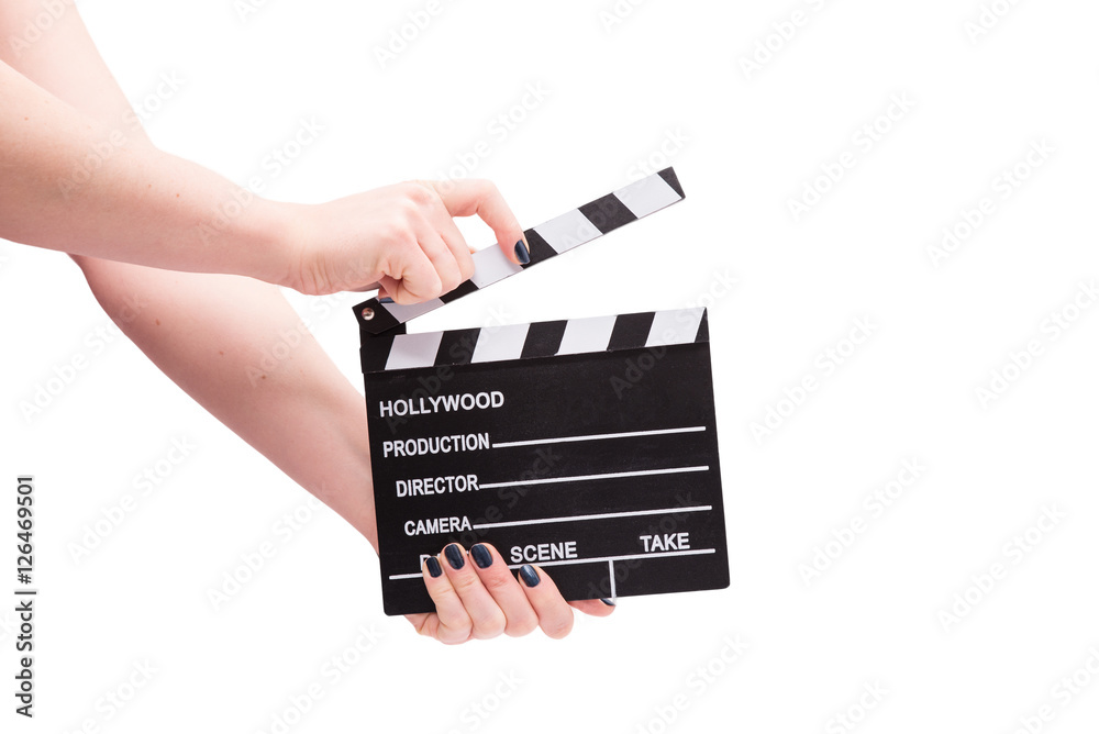 Two hands holding a cinema clap isolated on white