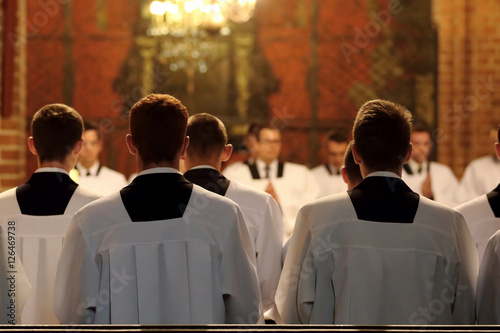 Obraz na płótnie The young clerics of the seminary during Mass