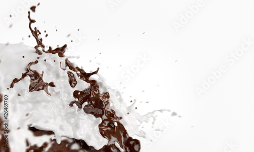 Splashes of joining chocolate and milk liquids