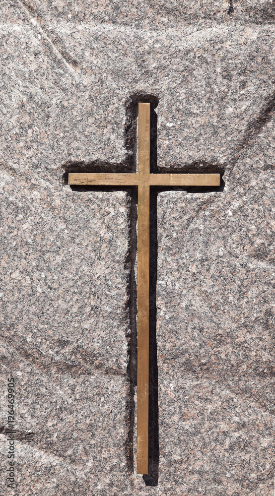 Christian cross in stone