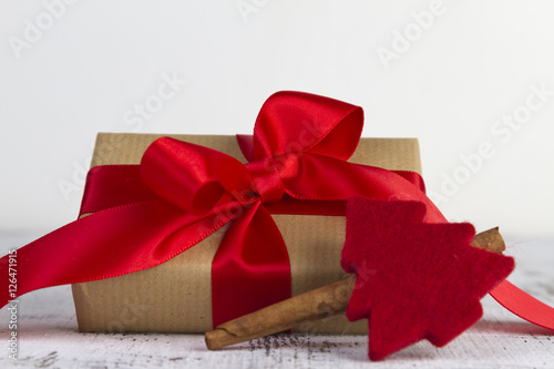 gift wrapped with a red bow