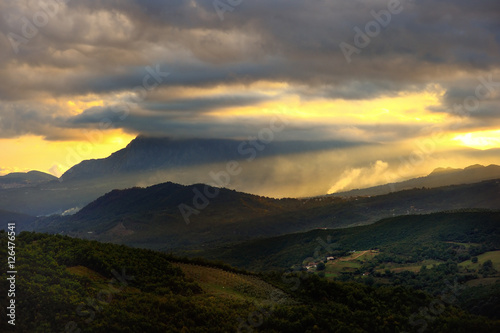 Scenic sunset landscape of the mountains in Italy