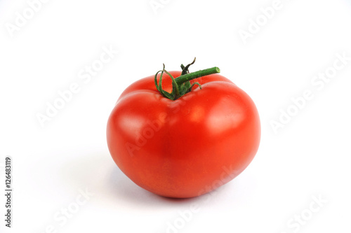 single fresh tomato isolated on white background