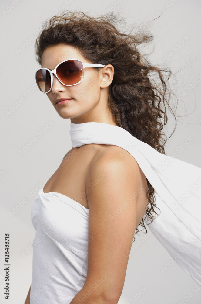Woman wearing big sunglasses and scarf Woman wearing big sunglasses and scarf