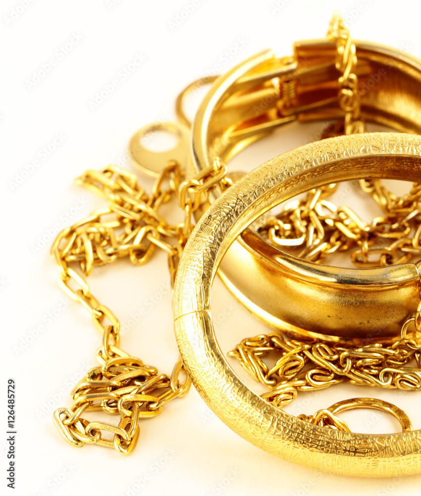 Gold jewelry, bracelets and chains. Luxury accessories. StockFoto
