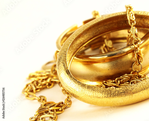 Gold jewelry, bracelets and...