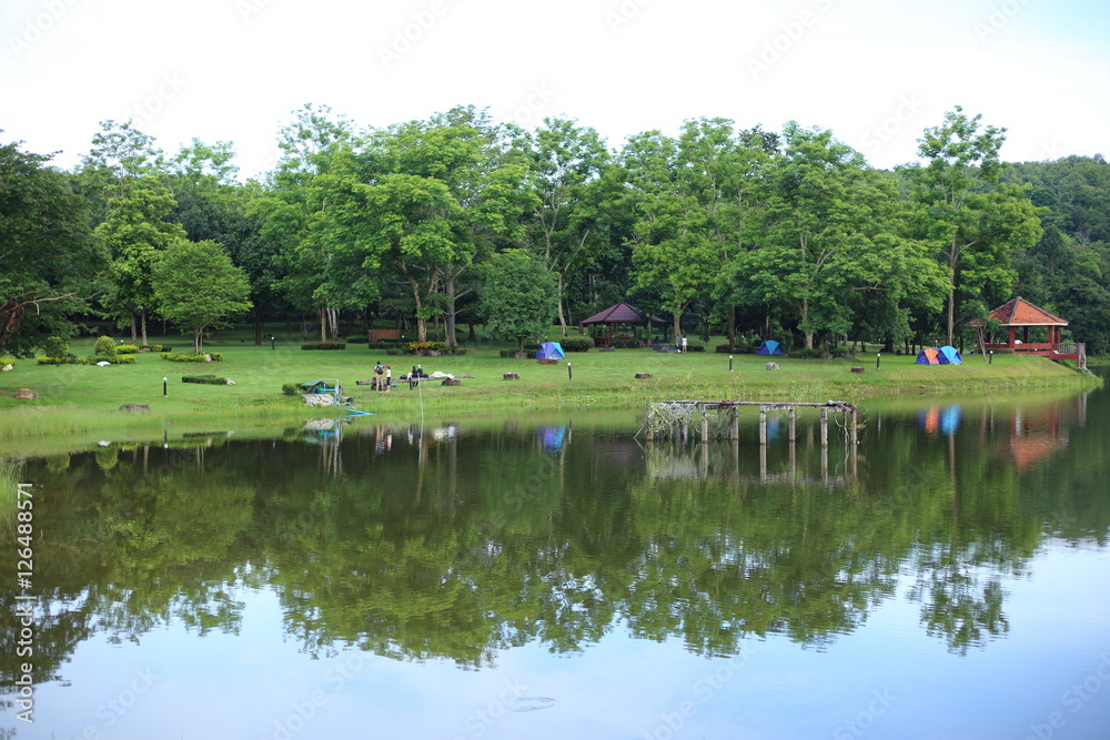 Camping Tents and reflection on lake at Chet Khot waterfall ,Thailand Camping Tents and reflection on lake at Chet Khot waterfall ,Thailand