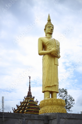 gold color Buddha of Wat Pak Nam Jolo in Chachoengsao at Thailand.
