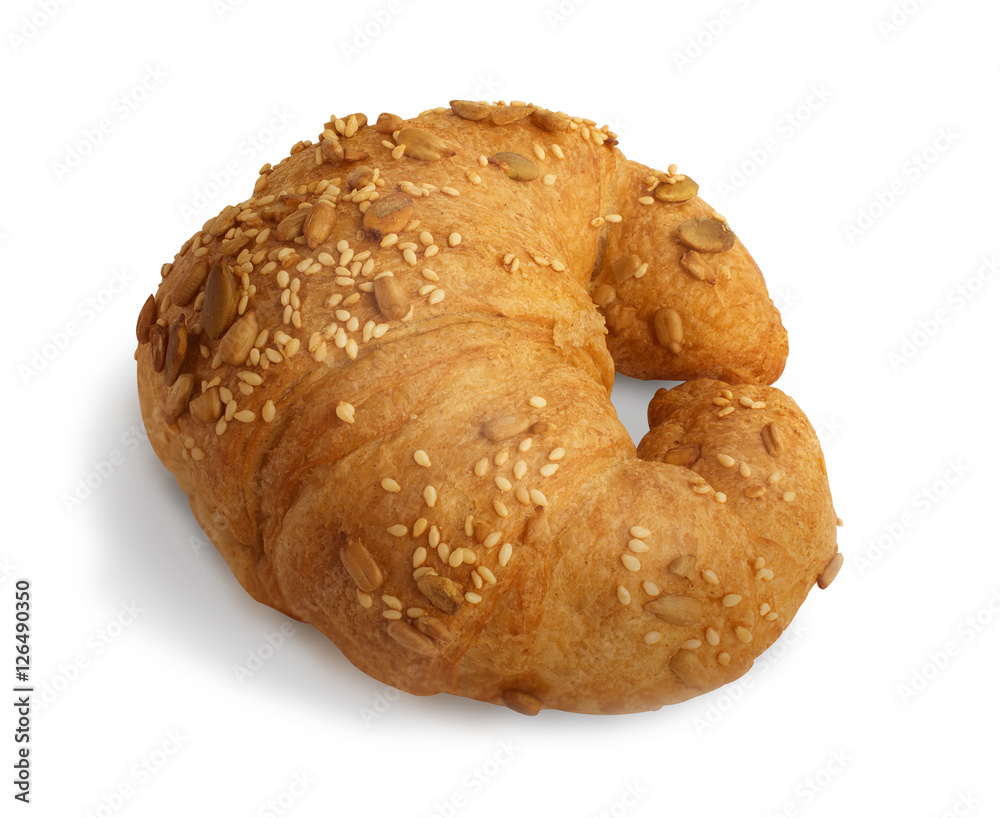 Croissant with sesame, pumpkin seeds isolated on a white background Croissant with sesame, pumpkin seeds isolated on a white background