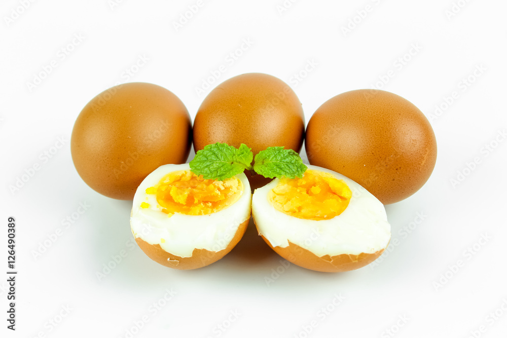 Boiled eggs cut in half isolated on white background Boiled eggs cut in half isolated on white background