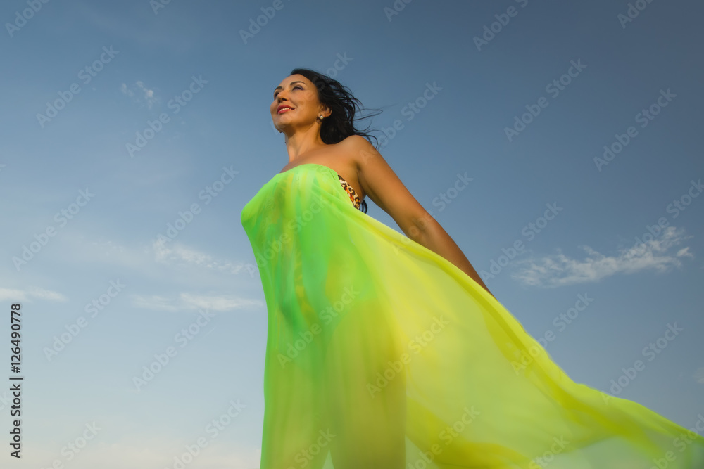 Beautiful adult woman in bikini and with pareo Beautiful adult woman in bikini and with pareo