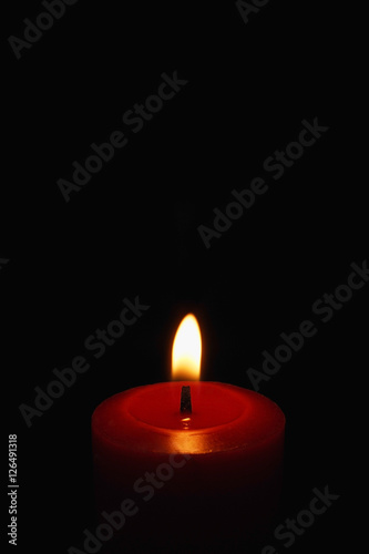 Red candle, lit