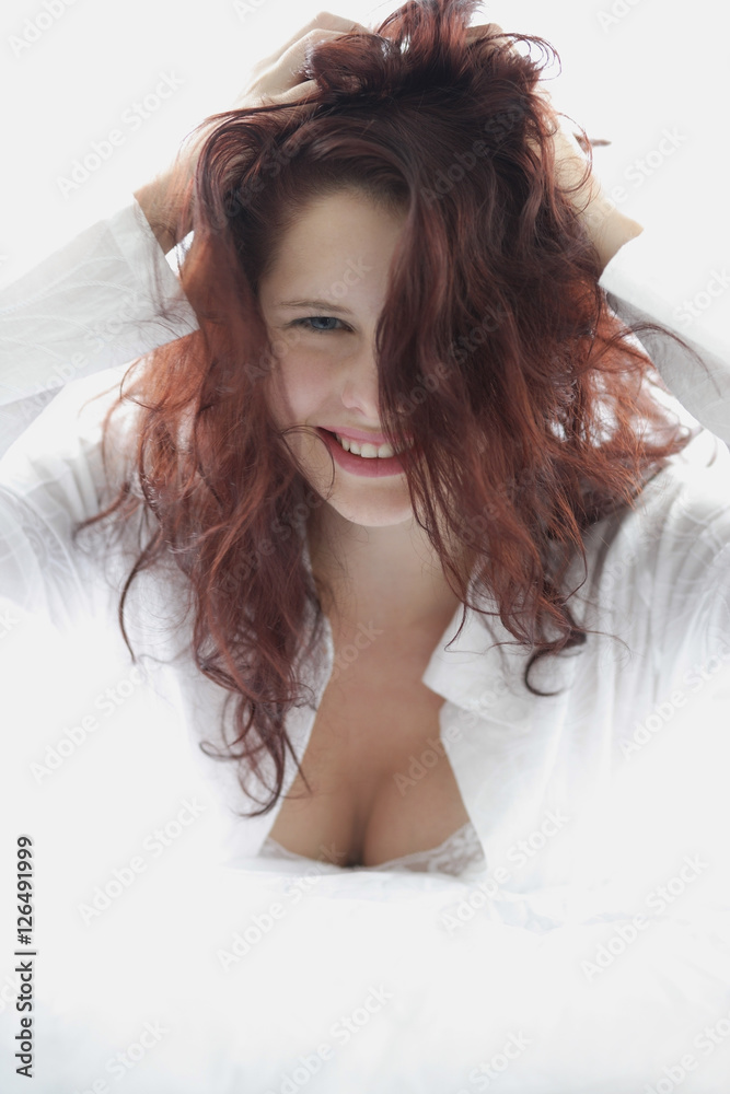Woman messing up her hair Woman messing up her hair