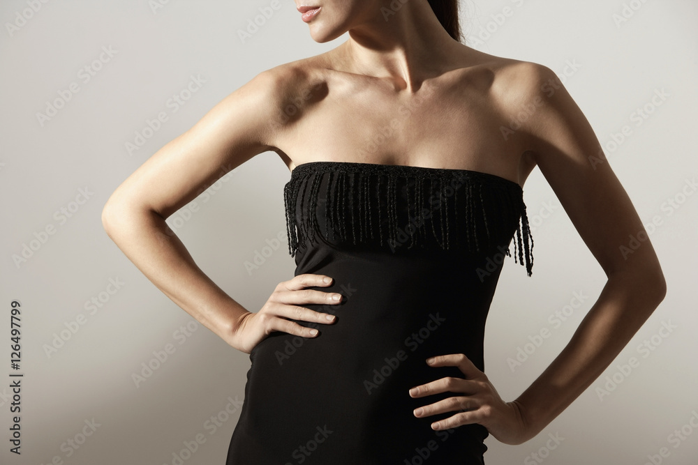 woman in black cocktail dress