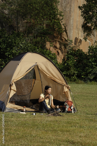 Young woman camping