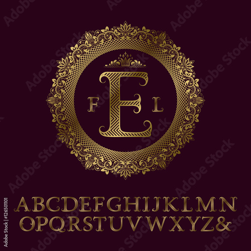 Zigzag striped gold letters and initial monogram in round floral frame with crown. Elegant font for logo design. Isolated english vintage alphabet.