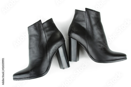 Female black boots isolated on a white background. Top view
