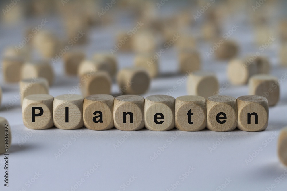 Fototapeta premium Planeten - Holzwürfel mit Buchstaben