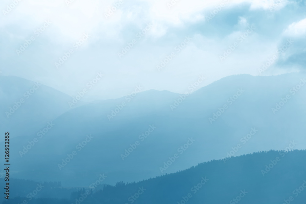 Mystic cyan blue foggy landscape with hills. Mystic cyan blue foggy landscape with hills.