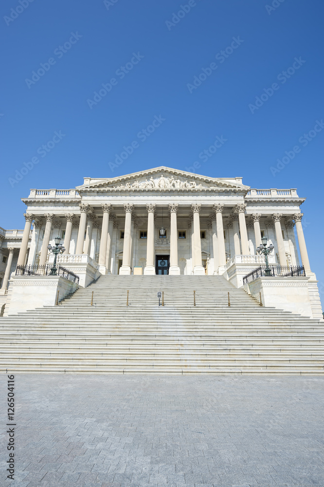 Scenic view of the United States Capitol building in Washington DC, USA from the Senate entrance staircase under clear blue sky
