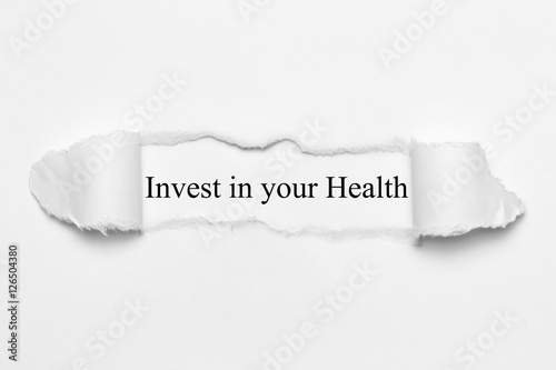 Invest in your Health on white torn paper