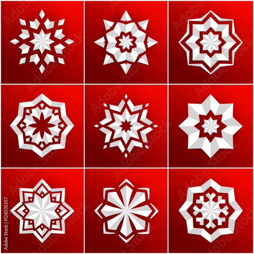 Set of volumetric white snowflake on a red background. Christmas star. Mandala. 