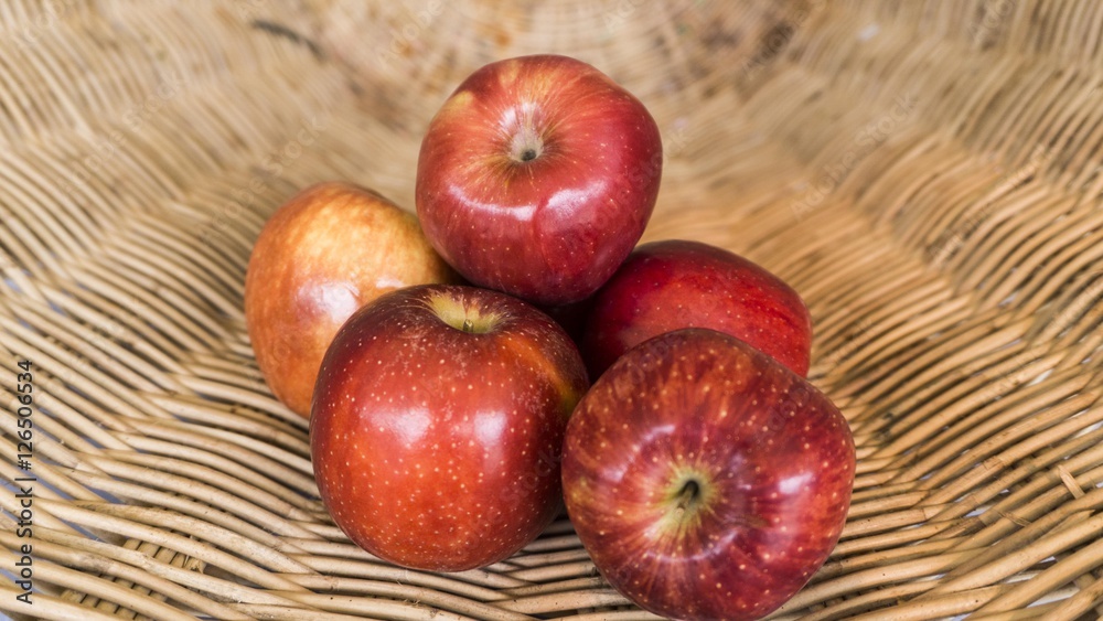red apples in the basket, selected focus on some apple and the b red apples in the basket, selected focus on some apple and the b