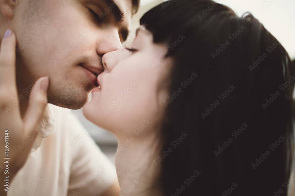 Sensual kiss of the two people in love Sensual kiss of the two people in love