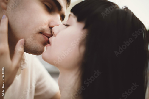 Sensual kiss of the two people in love