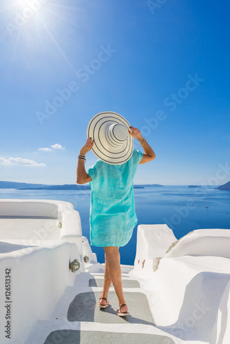 Young woman on holidays, Santorini Oia town