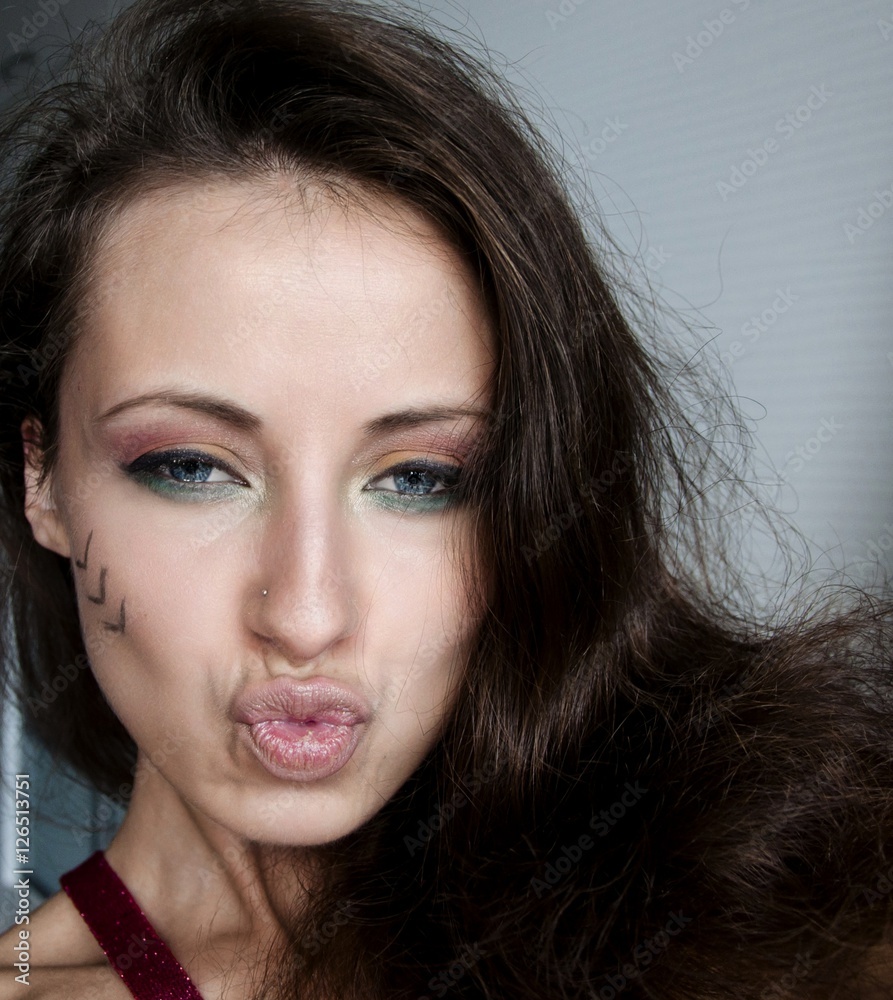 pretty girl with tribal makeup