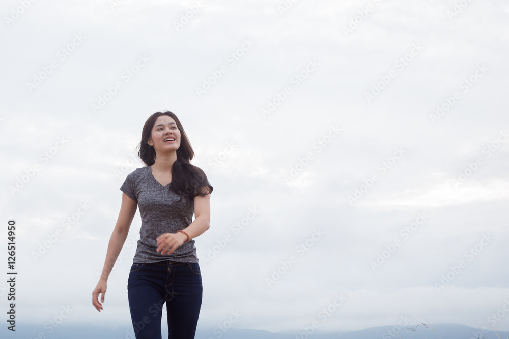 Young Asian fit woman relaxing with the river nature. Happy time Young Asian fit woman relaxing with the river nature. Happy time
