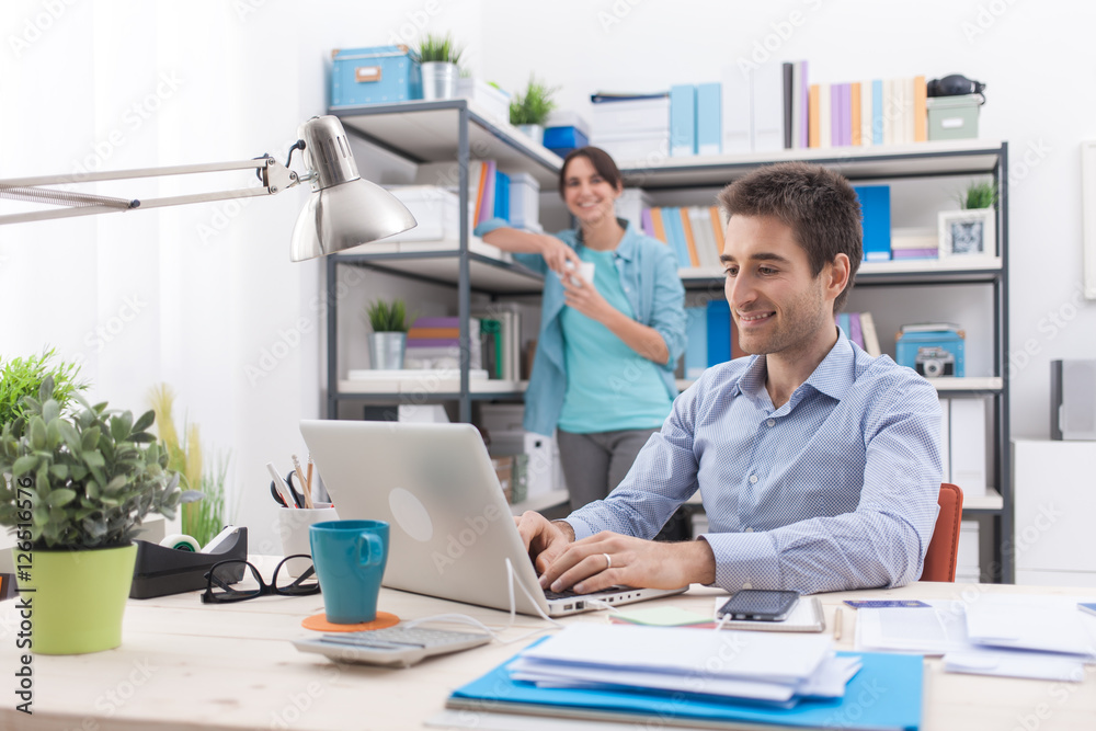 Two people working in the office