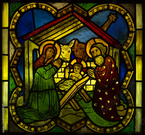 bright colorful stained glass, scenes from the life of Jesus, images of the apostles, saints and the figures from the Old Testament., Exposure stained glass, The Castle Museum in Malbork 24 May 2014