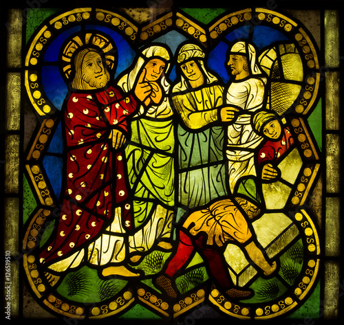 bright colorful stained glass  scenes from the life of Jesus  images of the apostles  saints and the figures from the Old Testament.  Exposure stained glass  The Castle Museum in Malbork 24 May 2014